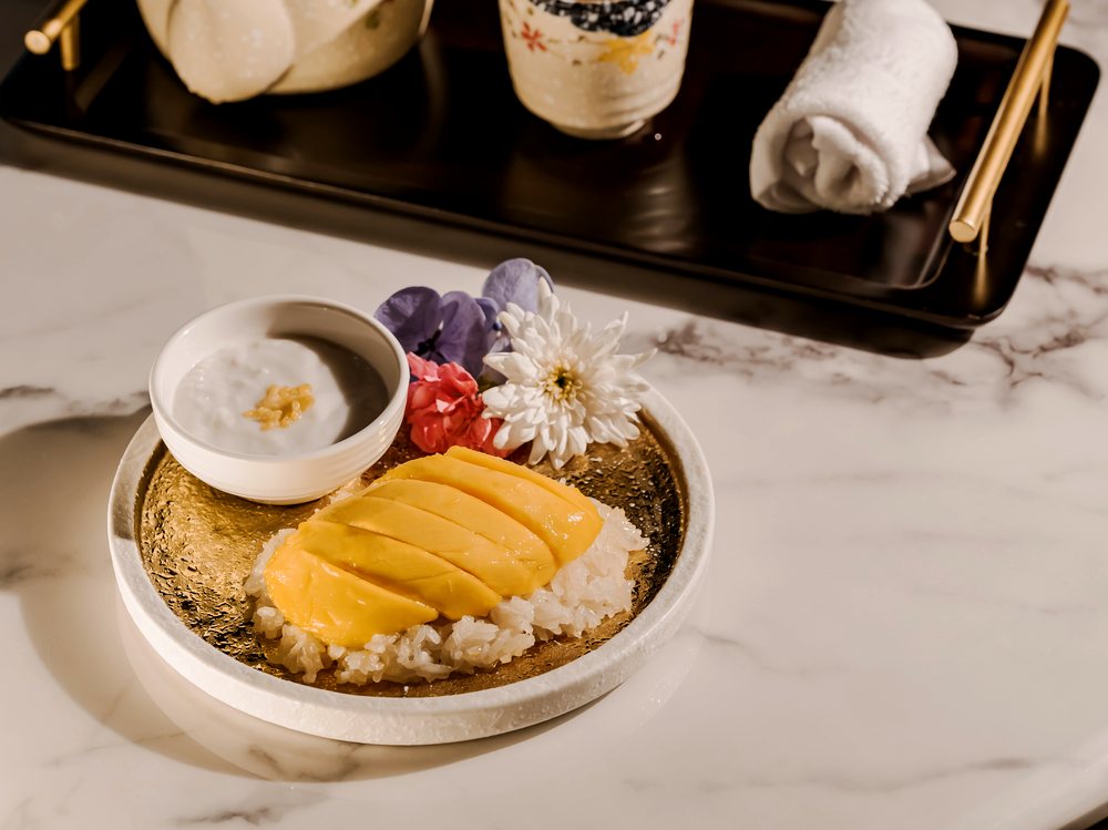 Welcome tea and mango sticky rice